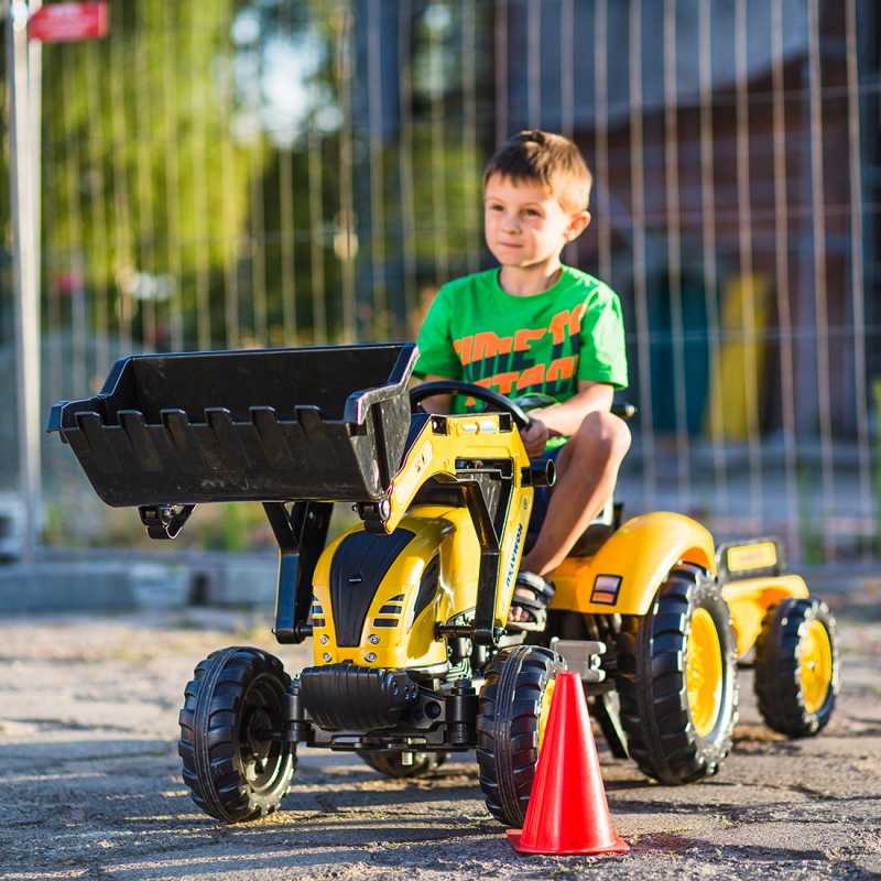 Didelis minamas traktorius su priekaba ir kastuvu - Falk Kubota, geltonas